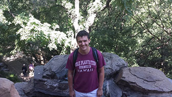 Nick Frazzette in front of rocks and trees